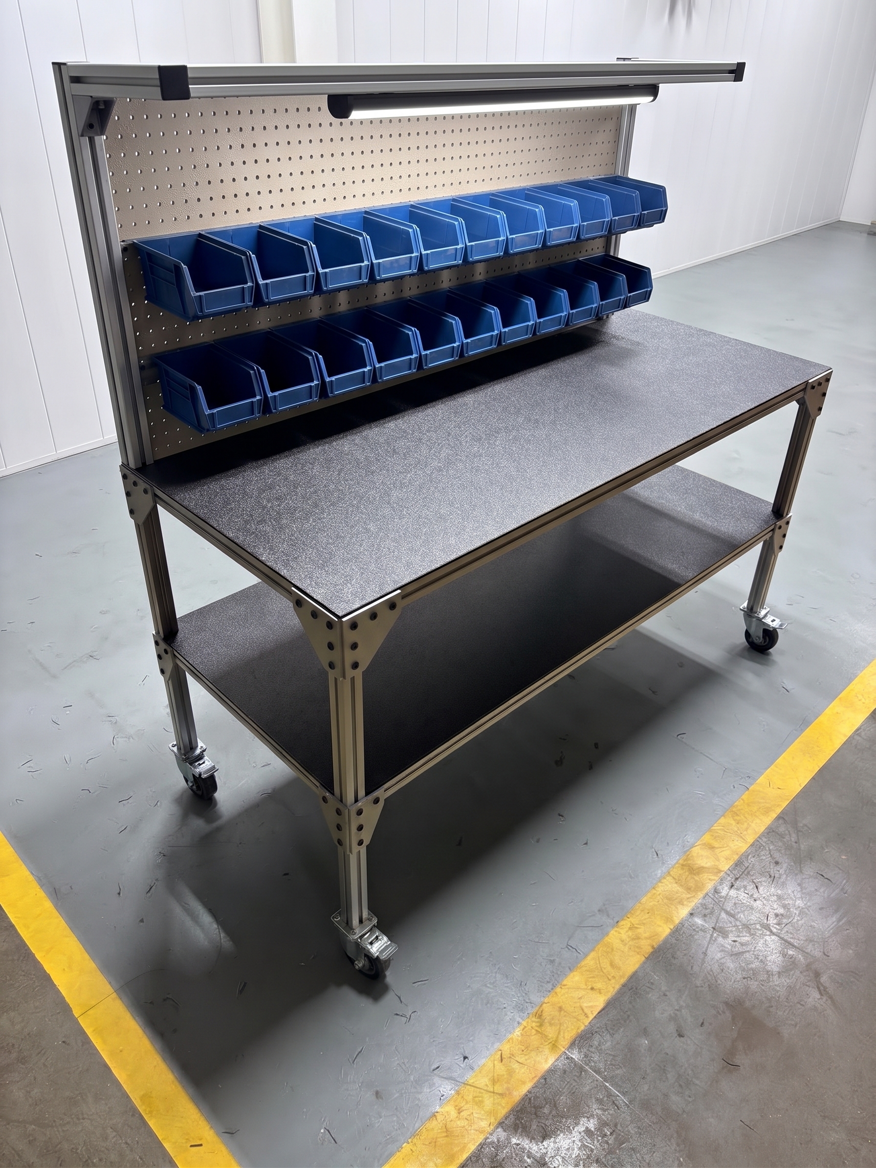 Mobile workcell with pegboard riser, parts bins and LED task light